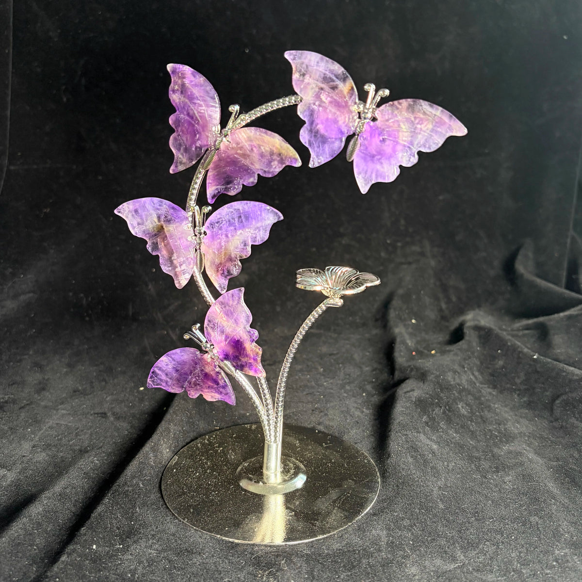 Crystal butterfly ornament on metal stand, purple stone wings