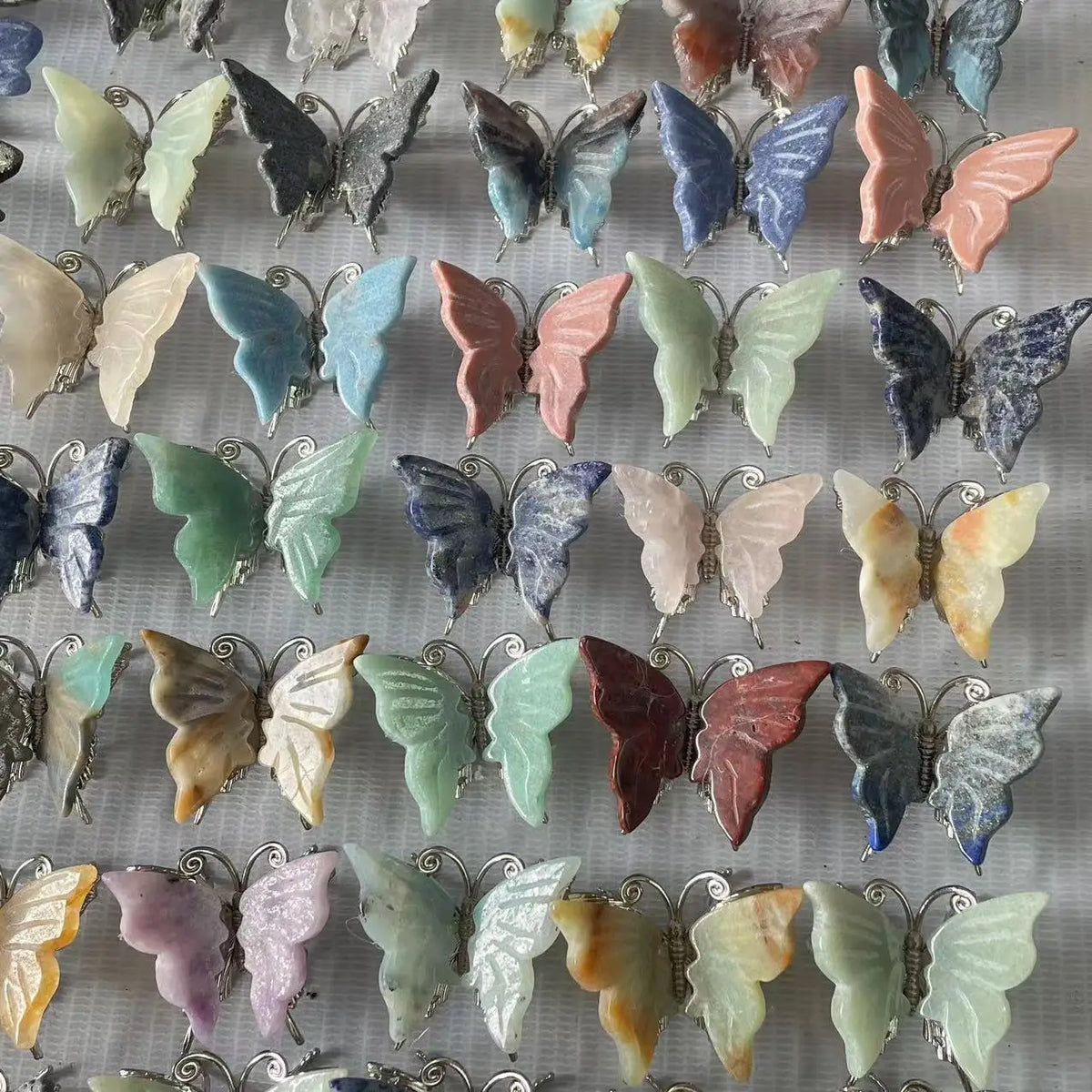 Crystal butterfly carvings in assorted stones