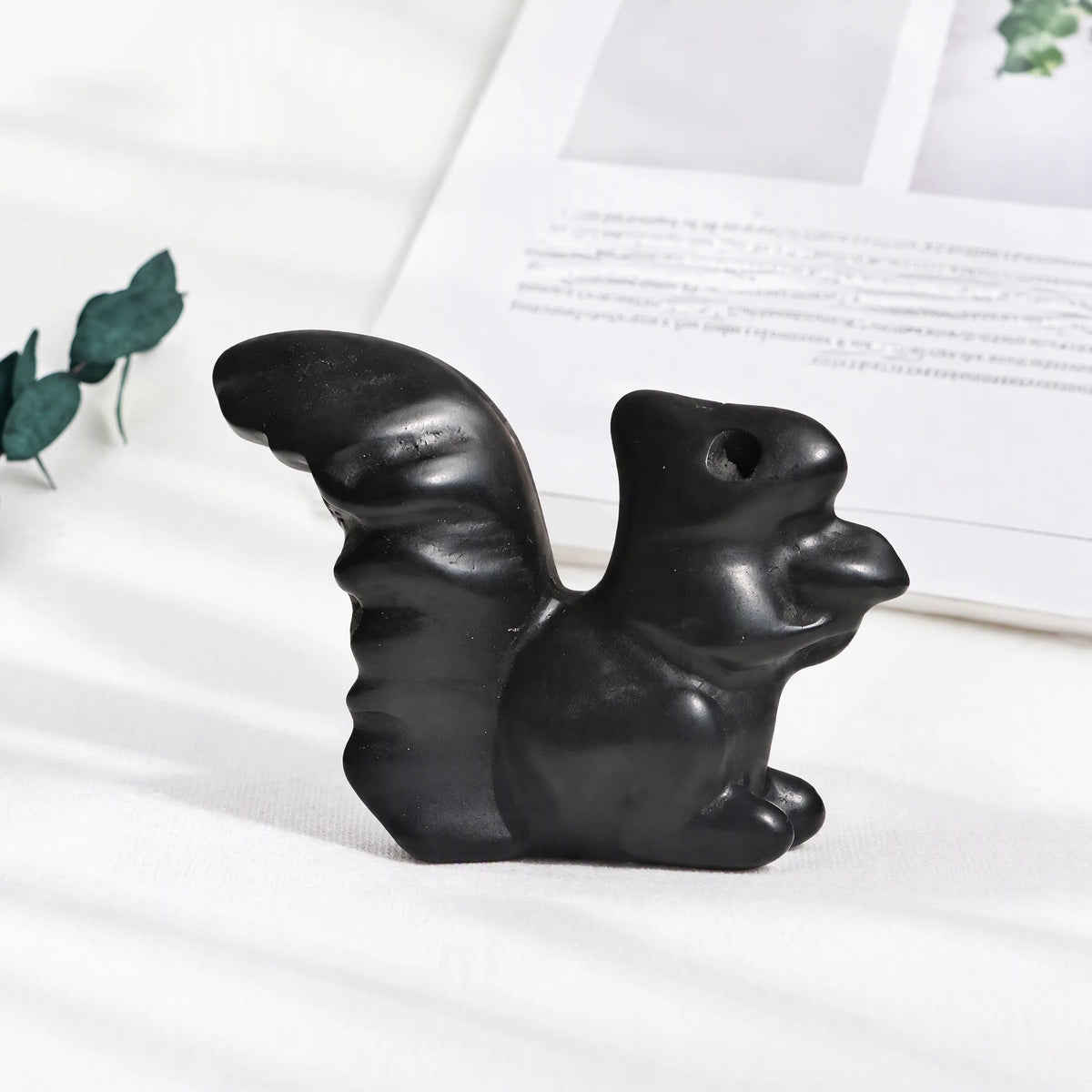 Obsidian crystal squirrel carving