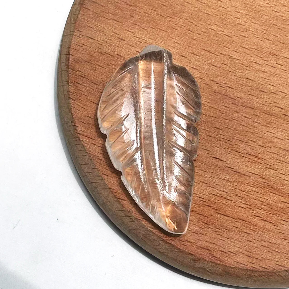 Crystal leaf carving in Golden Sheen Obsidian
