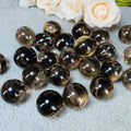 Natural Crystal Polished Small Size Rainbow Smokey Quartz Sphere