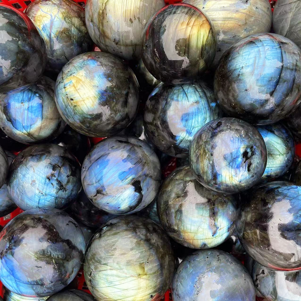 Natural labradorite sphere flash display